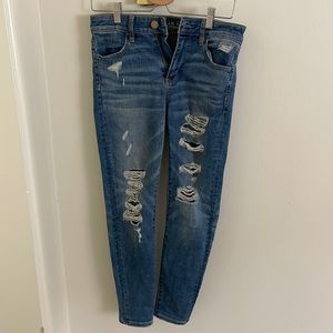 American Eagle light wash high rise distressed jeggings